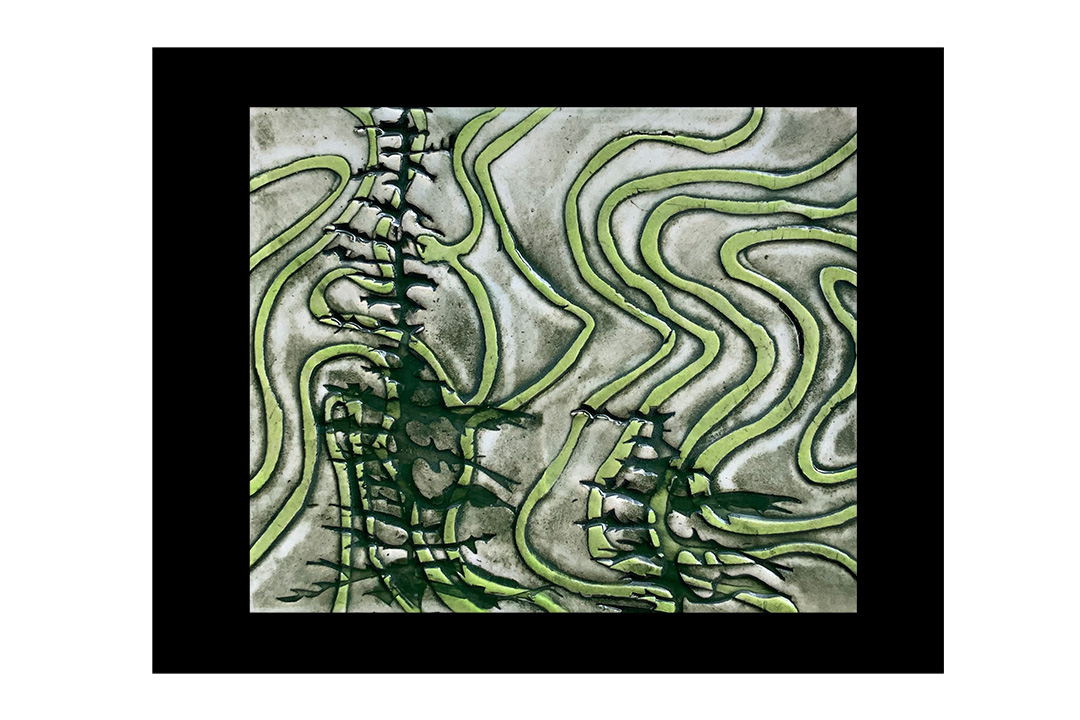 image of ceramic tile with trees and map lines